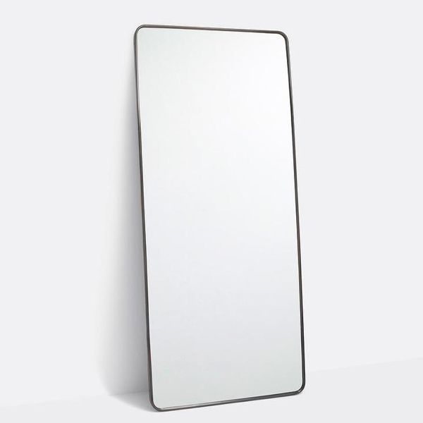 black metal framed rectangular mirror with rounded corners
